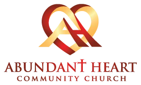 Abundant Heart Community Church logo — a heart drawn as a looping ribbon in red and gold with an A and H inside